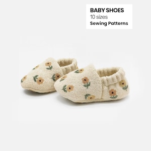 May include: A pair of cream-colored baby shoes with embroidered yellow and green floral patterns. The shoes have a soft, textured appearance and a gathered elastic opening. Text on the image reads: BABY SHOES, 10 sizes, Sewing Patterns.
