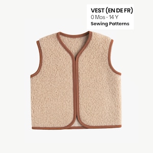 Op de afbeelding: Een beige vest met een bruine bies en een getextureerde, fuzzy buitenkant. Het vest heeft een V-hals en een sluiting in het midden. De tekst op de afbeelding luidt "VEST (EN DE FR) 0 Mos - 14 Y Sewing Patterns."