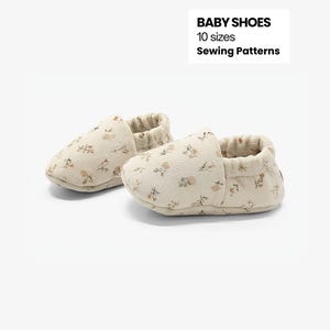 May include: Two beige baby shoes with a floral design. The shoes feature a repeating pattern of small flowers in brown and pink. The text "BABY SHOES", "10 sizes" and "Sewing Patterns" is visible.