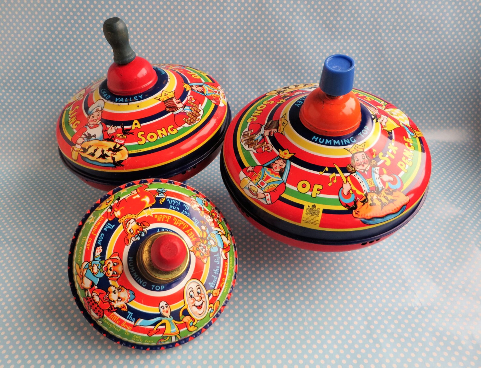 Vintage metal spinning top toy by Chad Valley with a wooden Etsy