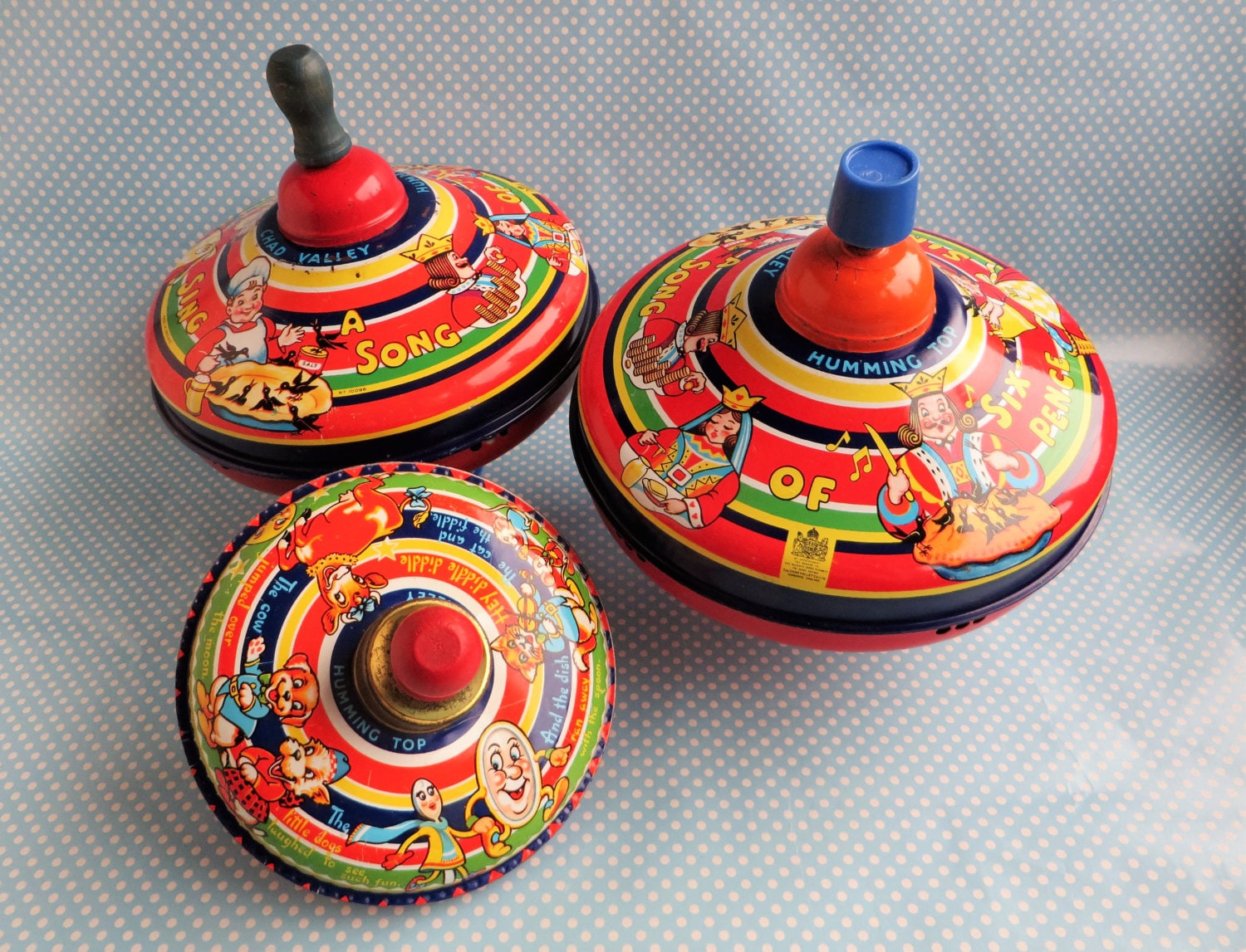 Vintage metal spinning top toy by Chad Valley with a wooden Etsy