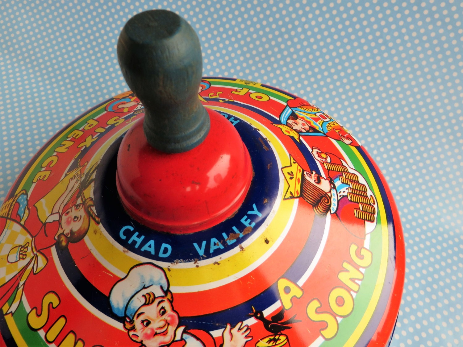 Vintage metal spinning top toy by Chad Valley with a wooden Etsy
