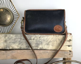 Vintage Dooney & Bourke Black Pebbled All Weather Leather Crossbody Purse with Brown Trim