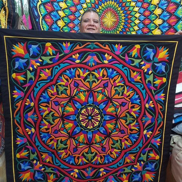 Hasan Kamal is showing his recent Beautiful Lotus  Design in Dark background-Multi colors. Master piece by Tentmakers of Cairo.