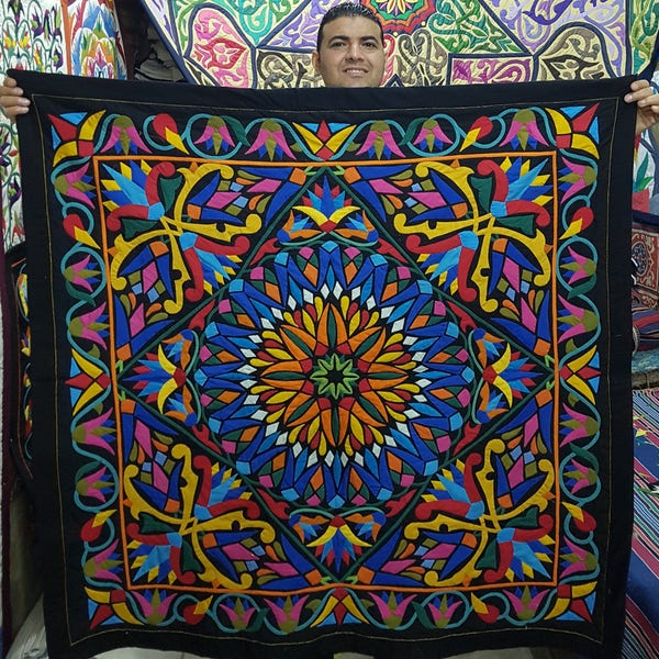 Nabel Kamal, a Beautiful Lotus and Rome Design in black-background Multi-colors. Master piece by Tentmakers of Cairo.