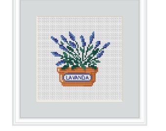 May include: A framed cross-stitch embroidery of a potted lavender plant with the word "LAVANDA" on the pot.