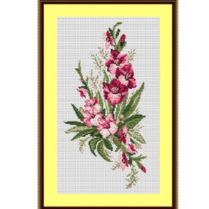 May include: A framed cross-stitch embroidery featuring a bouquet of pink and white gladiolus flowers with green leaves on a white background.