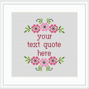 May include: Cross stitch pattern with pink flowers and green leaves. The text "your text quote here" is in the center of the pattern.