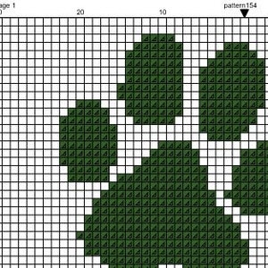May include: A green floral design with five petals, each petal is made up of small triangles. The design is on a white background.