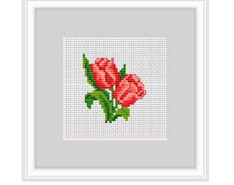 May include: A cross-stitch embroidery of two red tulips with green leaves on a white background.