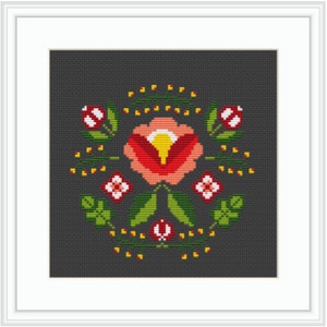 May include: A cross-stitch pattern featuring a red and pink flower with yellow center surrounded by green leaves and yellow dots on a dark gray background.