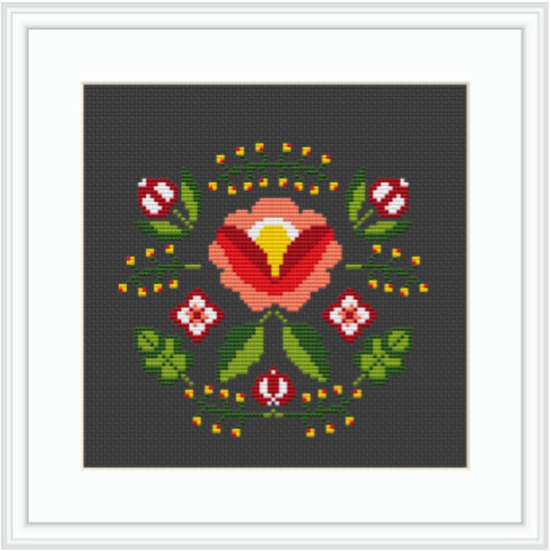 May include: A cross-stitch pattern featuring a red and pink flower with yellow center surrounded by green leaves and yellow dots on a dark gray background.