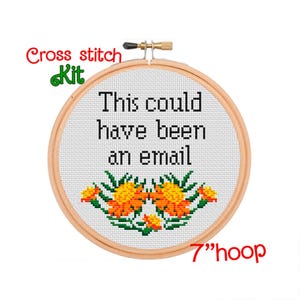 May include: Cross stitch kit featuring the text "This could have been an email" with a floral design in orange, yellow, and green colors. The kit is for a 7-inch hoop.