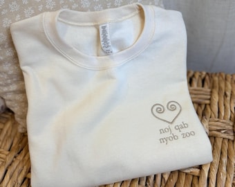 Hmong Noj Qab, Nyob Zoo Sweater