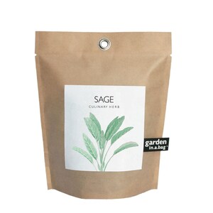 May include: A brown paper bag with a white label that says "Sage Culinary Herb" and a green illustration of a sage plant. The bag also has a black label that says "garden in a bag".