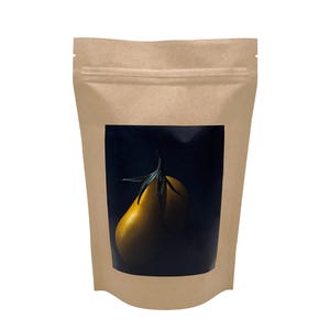 May include: A brown paper bag with a label featuring a yellow pear on a dark blue background.
