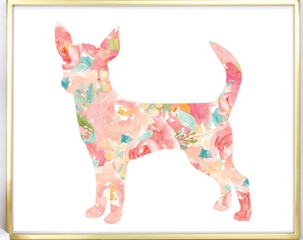May include: A floral print chihuahua silhouette in pink, peach, and green colors. The silhouette is printed on white paper and framed in a gold frame.
