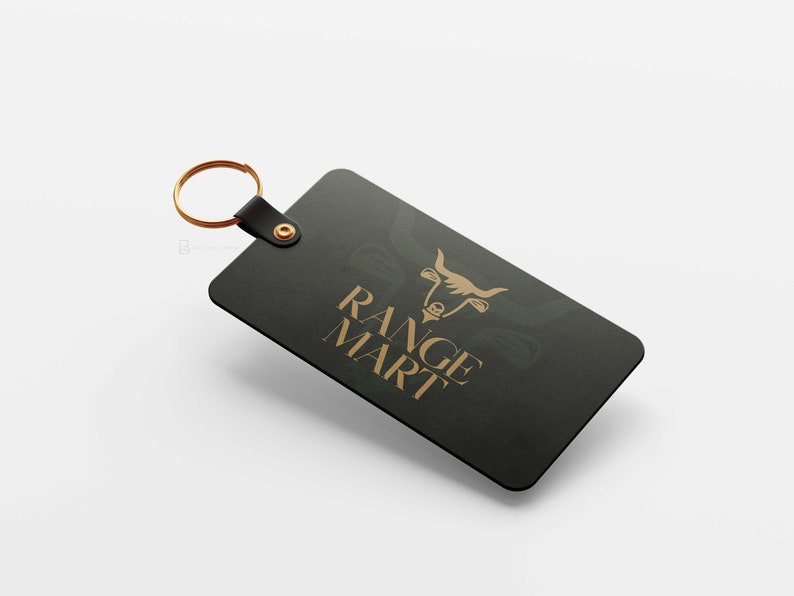 May include: A black keychain with a gold bull head logo and the text "RANGE MART" in gold lettering.