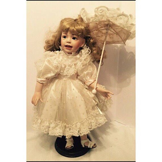 camelot porcelain doll