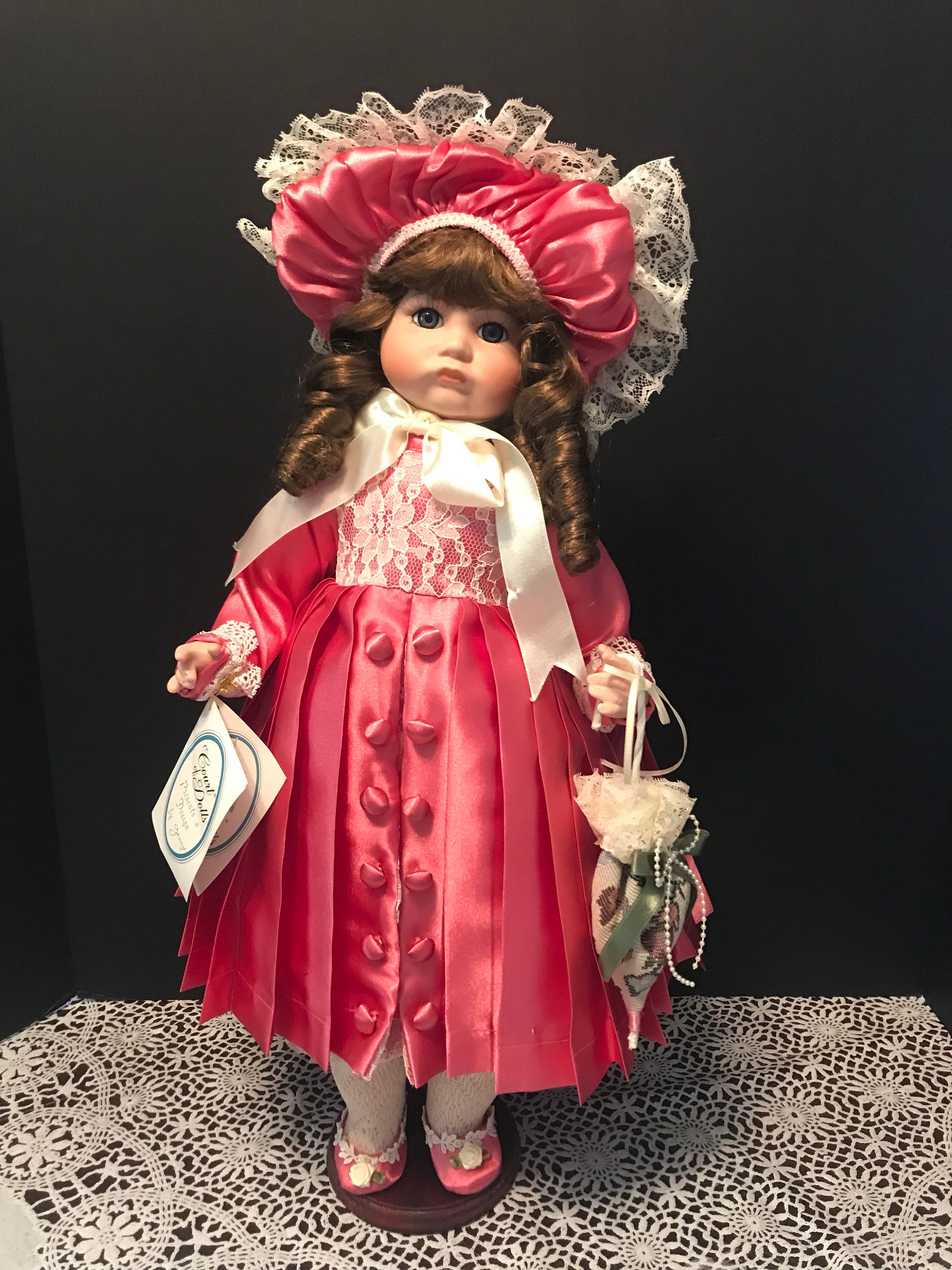 Court of dolls sales porcelain doll