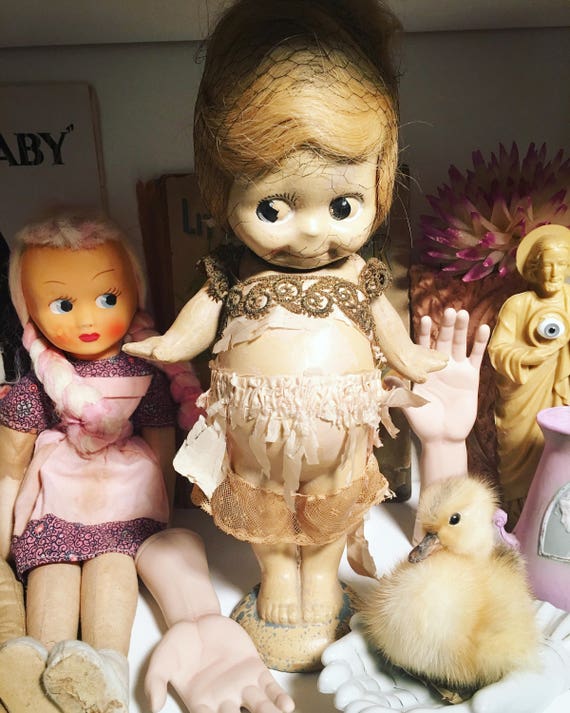 kewpie doll with wings
