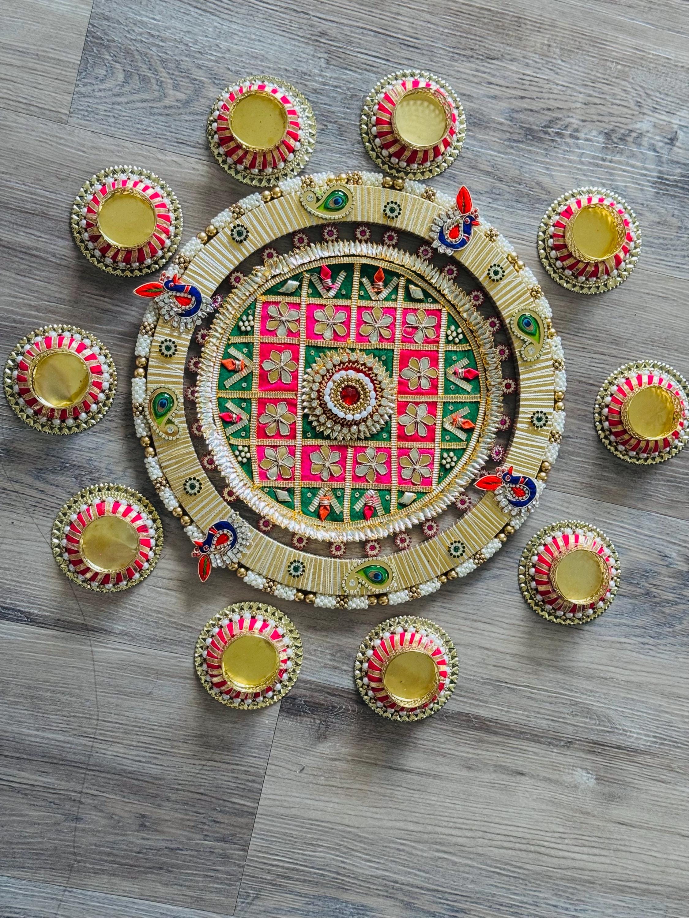 Rangoli diya and decor
