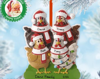 May include: A Christmas ornament featuring four chicken figures wearing Santa hats and scarves. Each chicken has a name on its scarf: David, Tracy, Ben, and Tony. The ornament is on a green base with the text "Davis Family 2026".