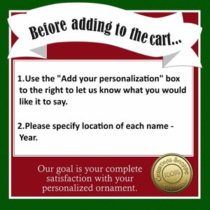 May include: A red and white sign with the text "Before adding to the cart..." and instructions for customizing a personalized ornament. The sign also includes a gold circular sticker with the text "Christmas Shoppe 100%".
