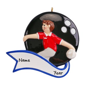 May include: A personalized Christmas ornament featuring a cartoon bowler holding a bowling ball. The ornament has a blue banner with the words "Name" and "Year" on it.