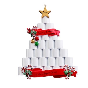 May include: White Christmas tree ornament shaped like a stack of toilet paper rolls with a red ribbon that says "Toilet Paper Crisis" and a smaller red ribbon that says "Family Name".