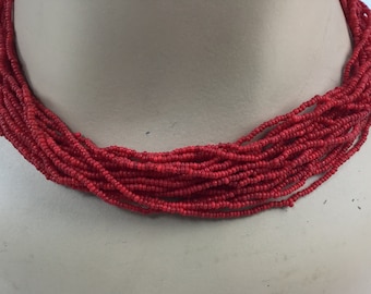 Vintage blood-red glass bead necklace. 20 strands. 1970s.