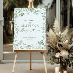 Plantilla de letrero de bienvenida para baby shower en Toile de Jouy verde, bebé en flor, flores silvestres, chinoiserie, bebé brunch, mariposas, pájaros, Toile verde oliva WP1007