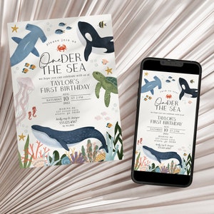 May include: An invitation for a first birthday party with an "Under the Sea" theme. The design features illustrations of marine life, including a whale, orca, and sea turtle. The invitation is displayed on a white background and a smartphone.