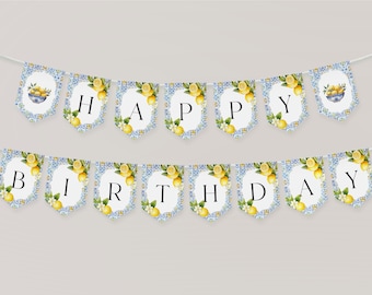 May include: A "Happy Birthday" banner with pennant flags. Each flag has a white center with a letter, surrounded by a lemon and floral design. The background features a blue and white tile pattern, with lemons in a bowl at each end.