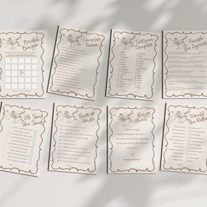 May include: Eight beige and brown bridal shower game cards are displayed. The cards include games such as "Bridal Bingo," "Couples Trivia," and "Would She Rather?" Each card has decorative borders and text.