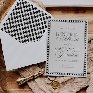 May include: A wedding invitation suite featuring a save-the-date card with the names Benjamin Williams and Savannah Johnson. The card is framed with a black border and includes the wedding date. An envelope with a black and white diamond pattern is visible.