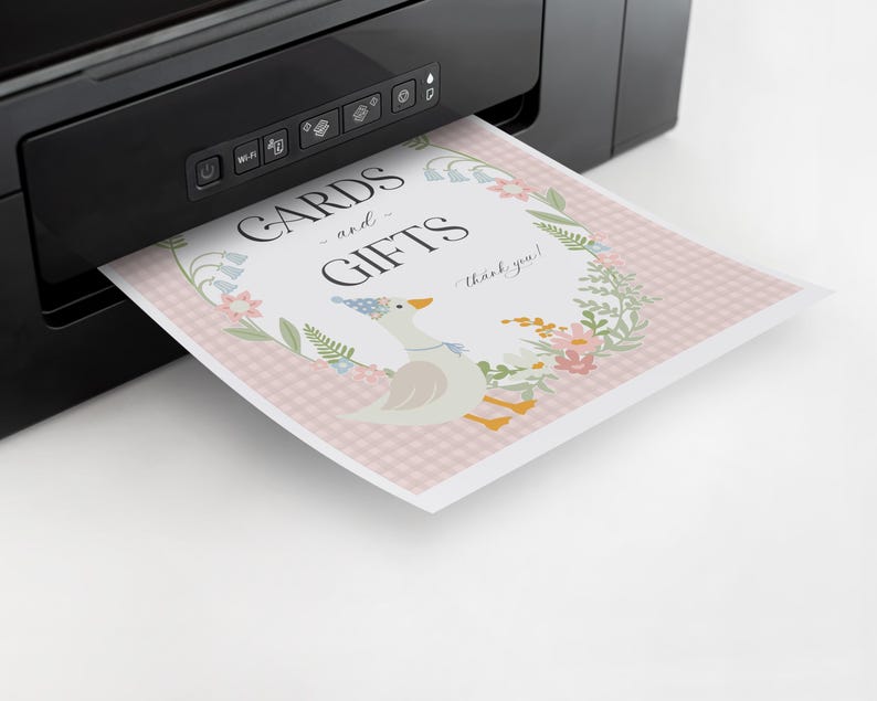 May include: A white printer with a pink and white card with the text "Cards and Gifts - thank you!" printed on it. The card has a floral design with a goose wearing a party hat.