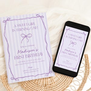 May include: A birthday invitation and a smartphone displaying the same design. The invitation and phone screen feature a purple striped background with text that reads "A Sweet Girl is Turning One!" and "Madison's First Birthday."