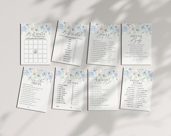 Puede incluir: Un conjunto de tarjetas de juego de baby shower imprimibles con un diseño floral azul y blanco. Los juegos incluyen Baby Bingo, Baby Traits, Famous Baby Names, Don't Say Baby, Guess the Price, Who Knows Mom Best y Would You Rather.