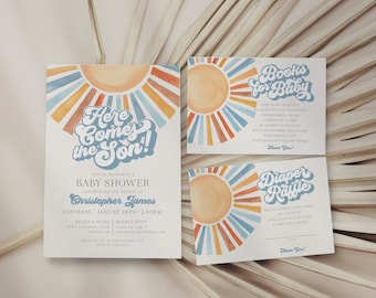 Peut inclure: Ensemble de faire-part de baby shower avec un motif de soleil à l'aquarelle orange, bleu et marron. L'invitation principale indique "Here Comes the Son !" avec les détails de l'événement. Comprend des cartes pour les livres et une tombola de couches.