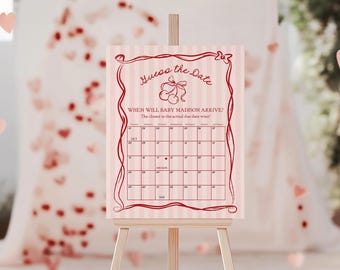 Peut inclure: Carte de jeu de baby shower imprimable rose et rouge avec le texte "Devinez la date" et un calendrier avec un cœur rouge marquant la date d'échéance. Le texte indique "Quand bébé Madison arrivera-t-il ? Le plus proche de la date d'échéance réelle gagne !"