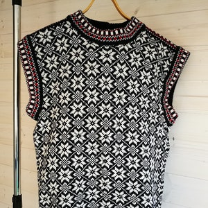 Folk knitted wool vest, traditional Kihnu troi pattern, black-white nordic star pattern scandinavian style