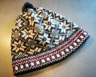 Fair isle knitted wool men hat in etnic estonian style with dark grey and white