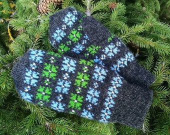 Fair isle knitted mittens in etnic estonian flower pattern style black and blue-green combination