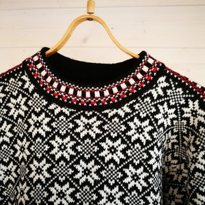 Folk knitted wool sweater, traditional Kihnu troi pattern, black-white nordic star pattern cardigan in scandinavian style image 3
