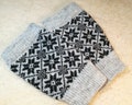 Grey knitted Bootcuffs with fair isle snowflake pattern, short model