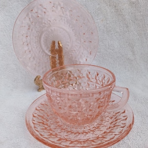 Jeanette Pink Depression Glass "Holiday" "Buttons and Bows" Teacup and Saucer