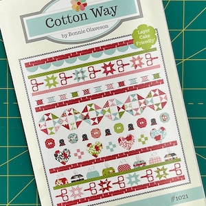 May include: A quilt pattern booklet with a red, white, and green quilt design. The title is "Cotton Way" by Bonnie Olaveson. The booklet is labeled "Layer Cake Friendly" and "#1021".
