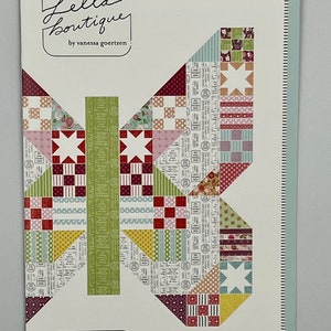 May include: A quilting pattern for a butterfly patch quilt. The pattern is called "Butterfly Patch" and is numbered #176. The pattern features a colorful butterfly design with red, white, green, yellow, and blue fabrics.
