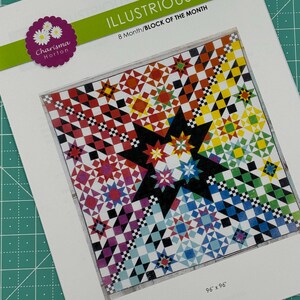 May include: A quilt pattern for an 8-month block of the month project called "Illustrious" by Charisma Horton. The quilt pattern features a colorful geometric design with a large black star in the center. The finished quilt will be 96 inches by 96 inches.